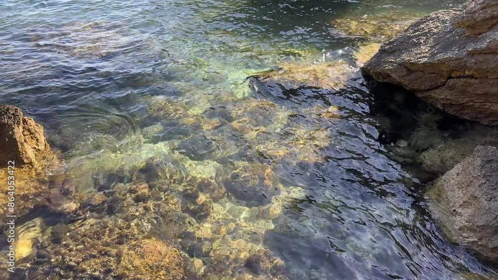 Flowing stream water and stones. Flowing stream water and stones.