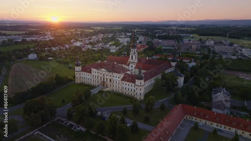 Hradisko Monastery in the city of Olomouc. Drone view of the historic military hospital building at sunset. photo