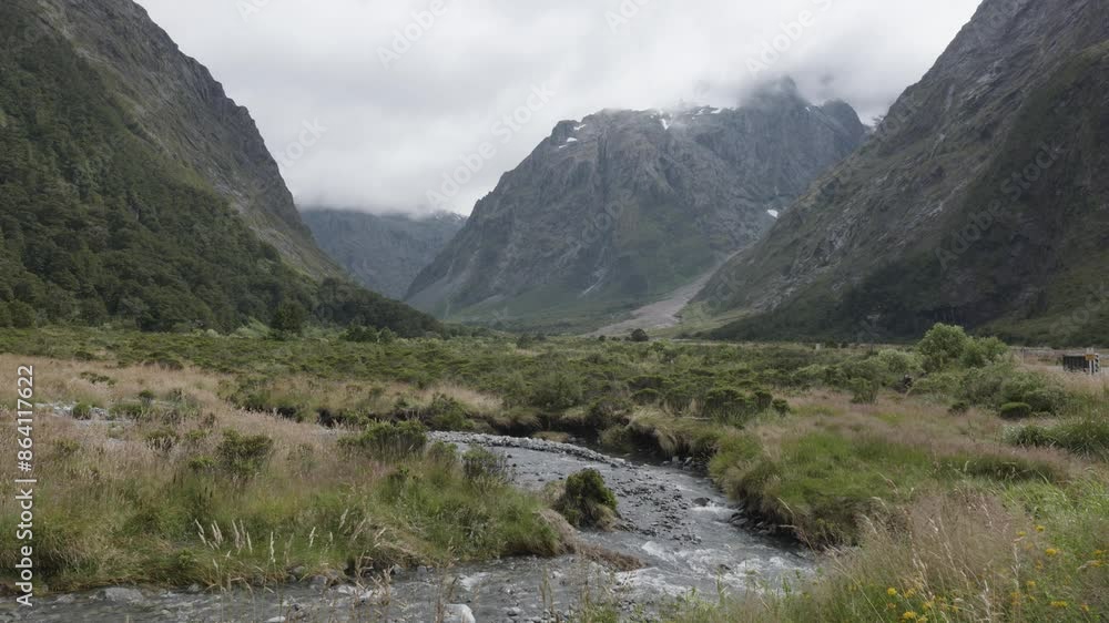 Monkey Creek valley view during a cloudy day in Fiordland, New Zealand. Monkey Creek valley view during a cloudy day in Fiordland, New Zealand.