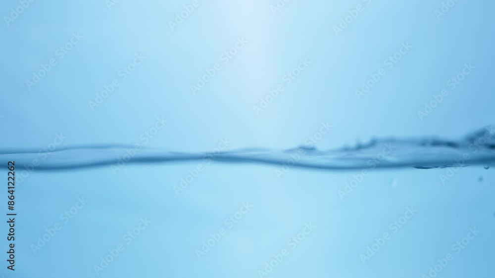 Liquid Tranquility Smooth Flowing Water Surface in Slow Motion. Blue Bliss Abstract Water Background with Gentle Ripple Motion. Liquid Tranquility Smooth Flowing Water Surface in Slow Motion. Blue Bliss Abstract Water Background with Gentle Ripple Motion.
