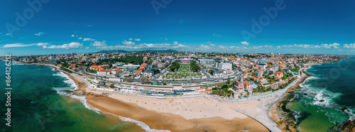 Aerial drone panoramic view of Tamariz beach with iconic Casino Estoril in the centre and Estoril neighbourhood on the Portuguese Riviera 28km west of Lisbon, Portugal, Europe