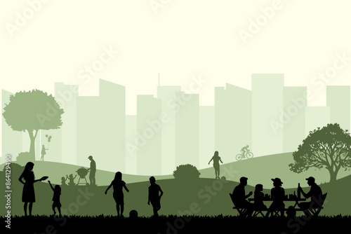 View of family holiday in the park with city buildings background