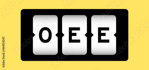 Black color in word OEE (abbreviation of overall equipment effectiveness) on slot banner with yellow color background photo