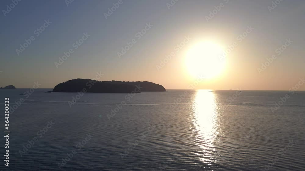 enjoying sunset on a tropical island beach Unbelievable aerial view flight drone enjoying sunset on a tropical island beach Unbelievable aerial view flight drone