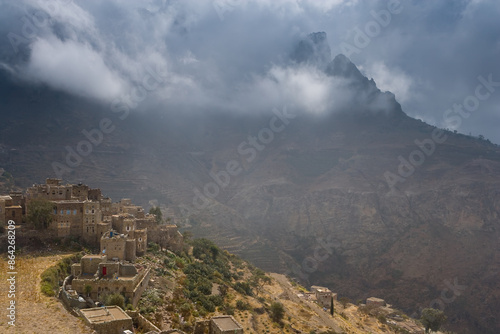 The old city and Manakha fortress with traditional terrace farming, Yemen photo
