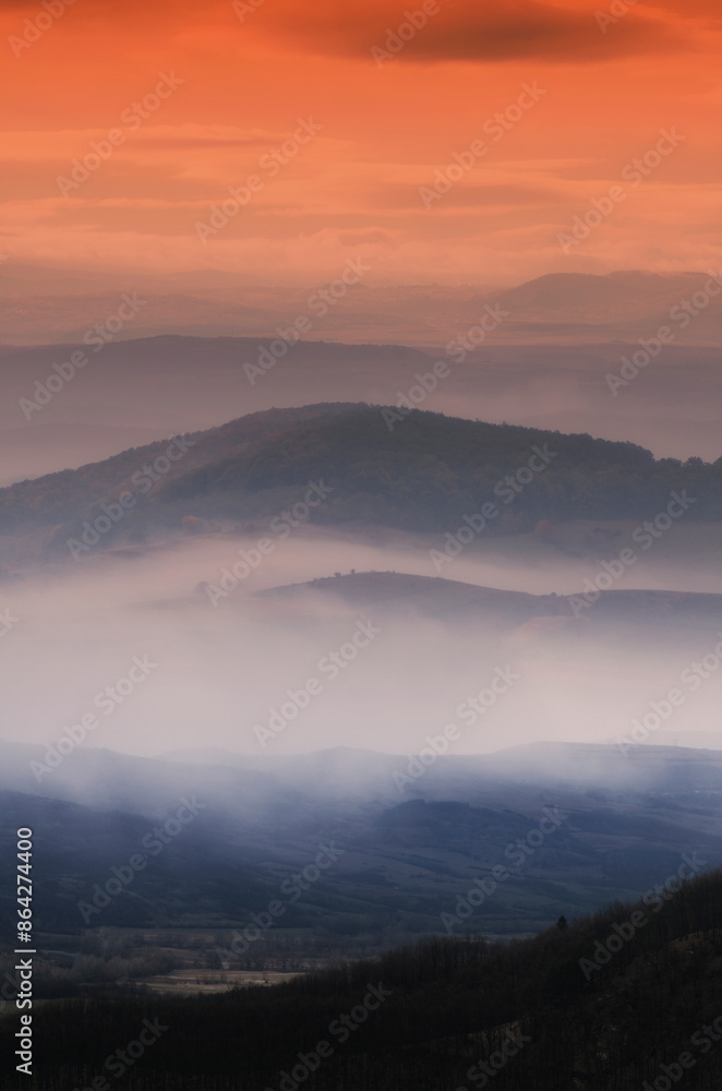 sunset landscape with colorful light in the mist sunset landscape with colorful light in the mist