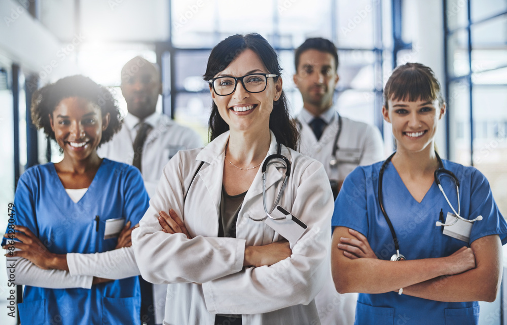Portrait, happy people or team of nurses with arms crossed in hospital for healthcare services or about us. Leadership, medical professional or proud doctors with smile at wellness clinic for nursing Portrait, happy people or team of nurses with arms crossed in hospital for healthcare services or about us. Leadership, medical professional or proud doctors with smile at wellness clinic for nursing