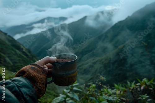 A serene mountain backdrop with a person holding a steaming cup of ceremonial cacao, overlooking the valley.