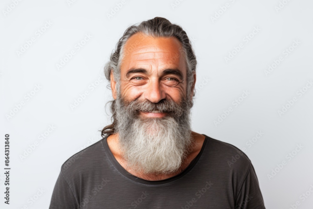 Smiling portrait of a mature beard man on white background Smiling portrait of a mature beard man on white background