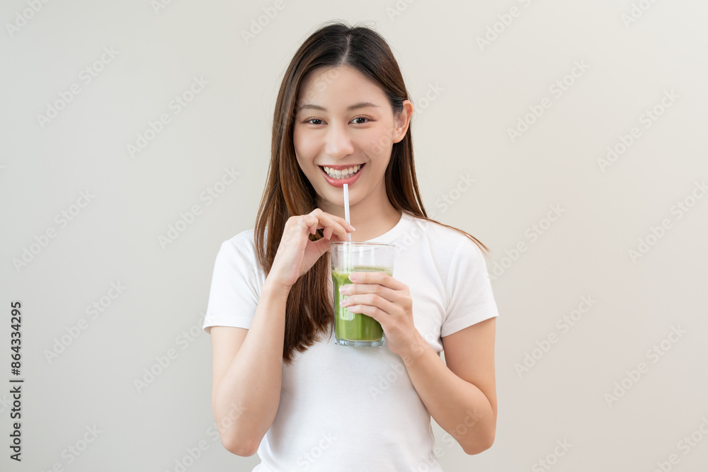 young woman drinking detox drink made by vegetable and fruit mixed. young woman drinking detox drink made by vegetable and fruit mixed.