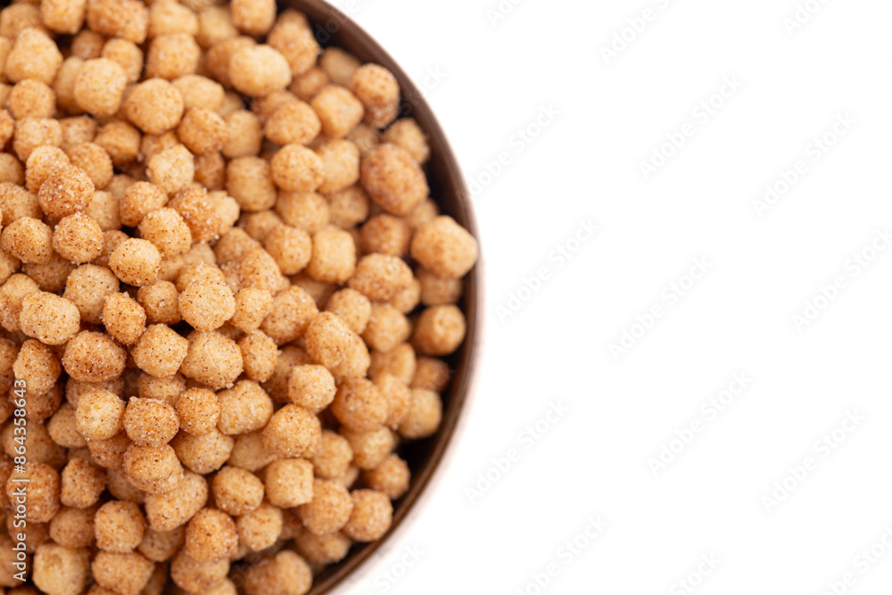 Mini Ball Shaped Cinnamon Toast Flavored Breakfast Cereal Isolated on a White Background Mini Ball Shaped Cinnamon Toast Flavored Breakfast Cereal Isolated on a White Background