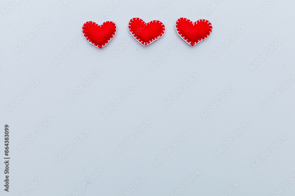 background of hearts of felt and two red hearts. background of hearts of felt and two red hearts.