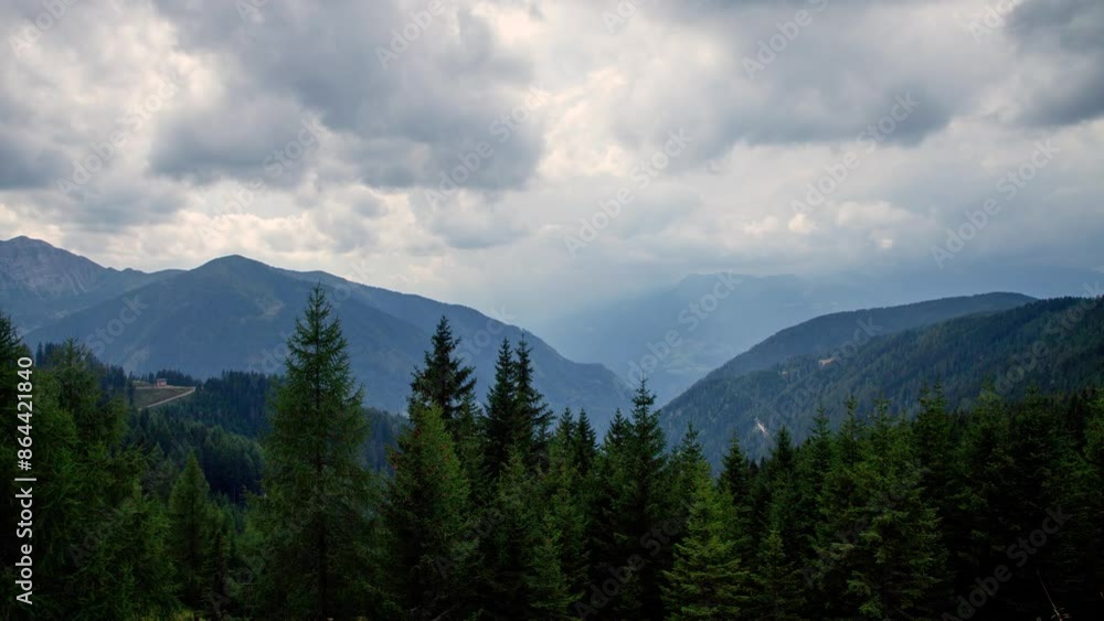 Timelapse of a valley before the storm in the Austrian Alps, moving right to left Timelapse of a valley before the storm in the Austrian Alps, moving right to left