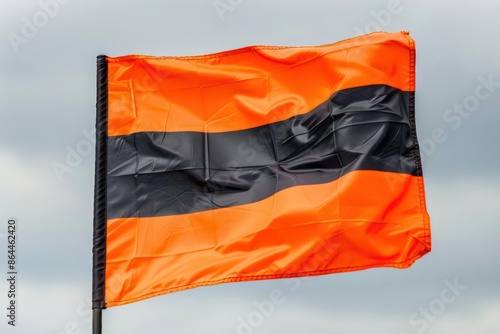 A closeup of the linesmans flag, with ample room for text on the banner photo