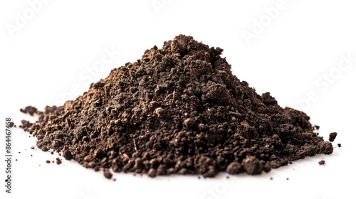 A small pile of brown earth sits on a clean white surface