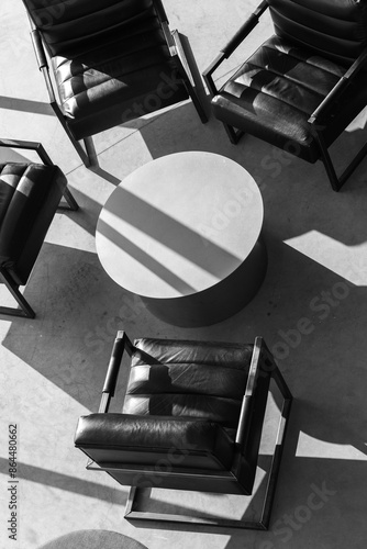 Wallpaper Mural Black armchairs stand around white round table at meeting room Torontodigital.ca