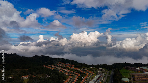 Cima, nubes y cielo azul a 2.700 metros sobre le nivel del mar. Alto de las Palmas, Antioquia, Colombia. photo