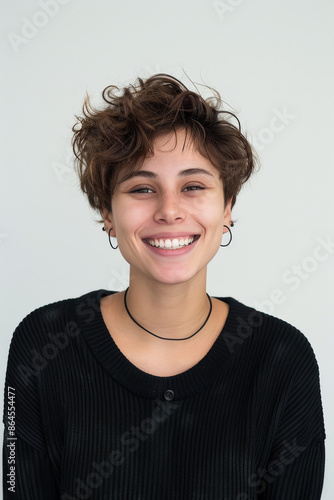 Portrait transgender person smiling warmly, wearing casual but stylish clothes. Concept LGBTQ