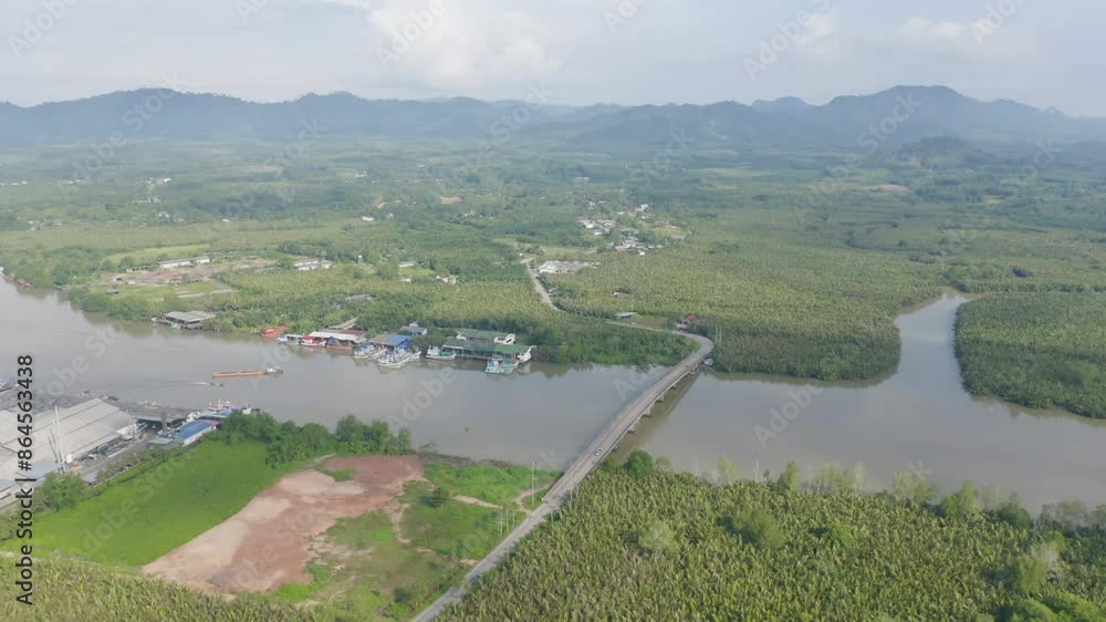 Aerial top view of a bridge with garden park with green mangrove forest trees, river, pond or lake. Nature landscape background, Thailand. Aerial top view of a bridge with garden park with green mangrove forest trees, river, pond or lake. Nature landscape background, Thailand.