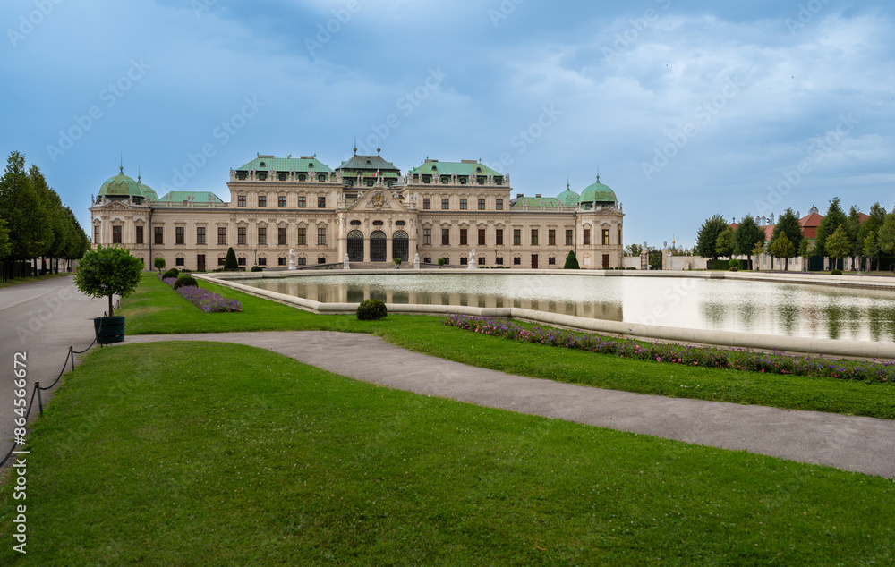 Vienna, Austria, August 18, 2022. Beautiful shot of the Belvedere Palace, a fairytale atmosphere with the gardens and the large fountain. Travel destinations. Vienna, Austria, August 18, 2022. Beautiful shot of the Belvedere Palace, a fairytale atmosphere with the gardens and the large fountain. Travel destinations.