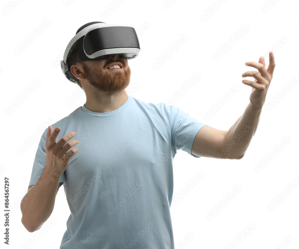 Smiling man using virtual reality headset on white background Smiling man using virtual reality headset on white background