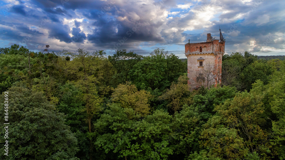 ruins of a tower in the forest ruins of a tower in the forest