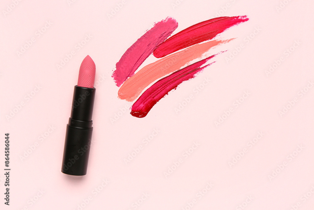Beautiful lipstick with different strokes on pink background Beautiful lipstick with different strokes on pink background