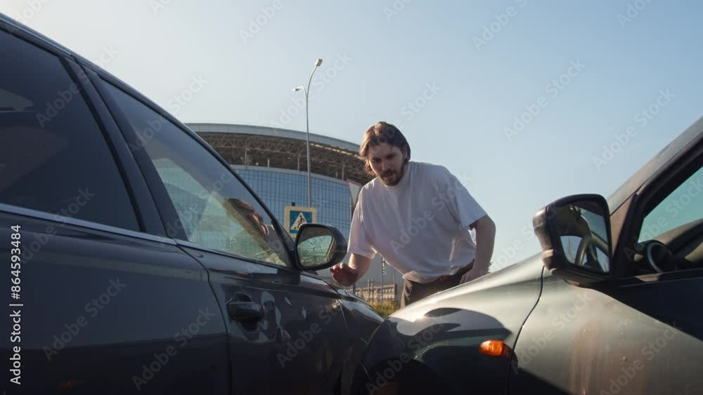 Person responsible for the accident, seeing the consequences, holds his head in his hands and expresses regret. Mid shot. Slow motion Person responsible for the accident, seeing the consequences, holds his head in his hands and expresses regret. Mid shot. Slow motion