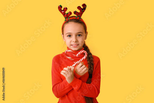 Cute little girl in reindee...