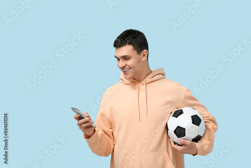 Young man with soccer ball ...