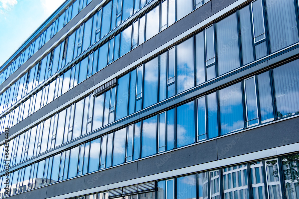Multi-story modern glass buildings, residential and office, Vertical living meets corporate ambition, Concrete jungle, business district Multi-story modern glass buildings, residential and office, Vertical living meets corporate ambition, Concrete jungle, business district