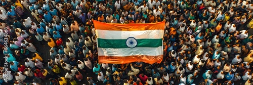 High angle view of a large crowd with Indian flag at a rally or public event
