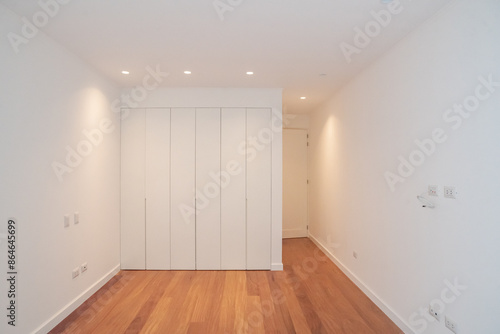 empty room with white wall and window