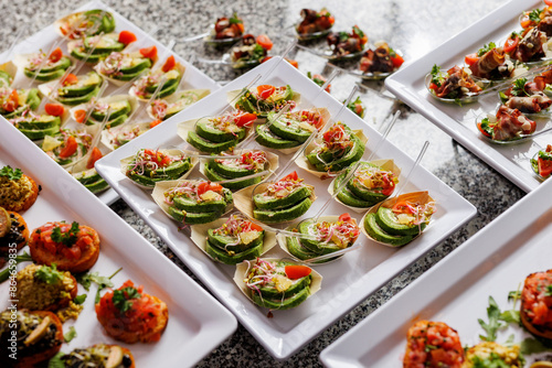 Εκτύπωση καμβά A culinary presentation featuring elegant hors d oeuvres on raised platters