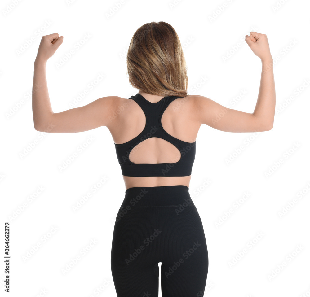 Woman with slim body showing muscles on white background, back view Woman with slim body showing muscles on white background, back view
