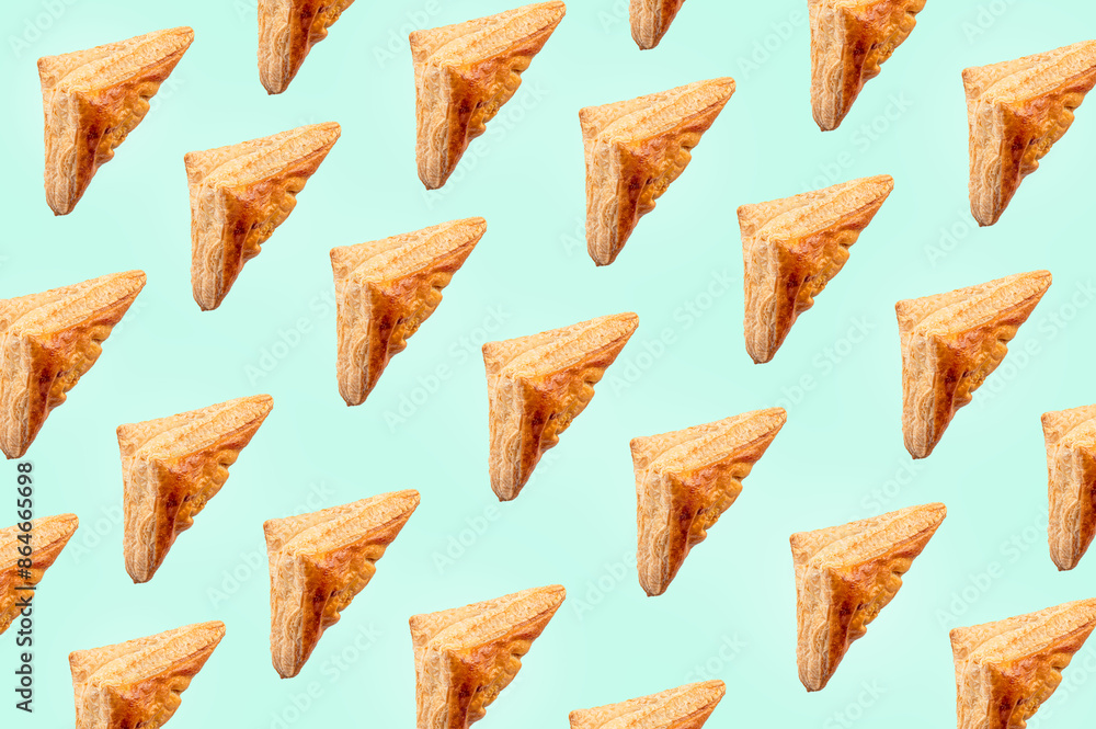 Pattern with puff pastry on cyan background. Pattern with puff pastry on cyan background.
