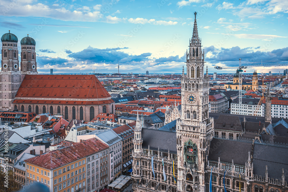 Fototapeta premium Panoramic view of the city with clear blue sky, iconic twin towers of Frauenkirche in the background.