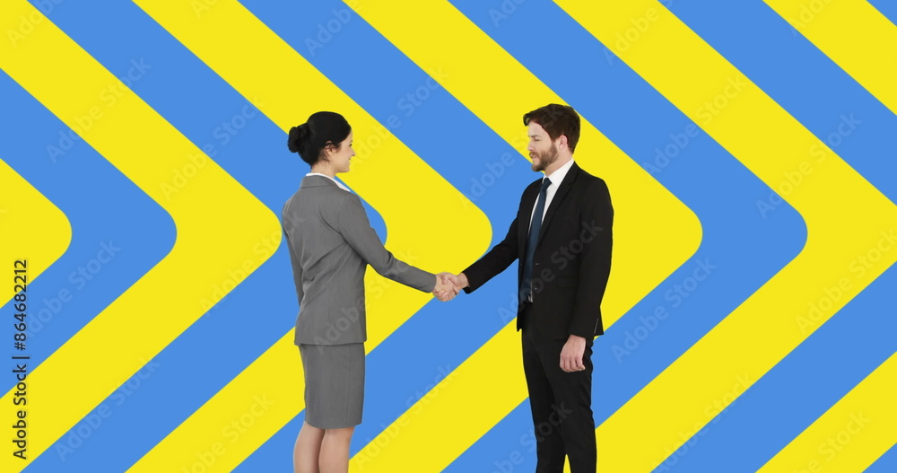 Image of caucasian business people shaking hands over colors of ukraine flag Image of caucasian business people shaking hands over colors of ukraine flag