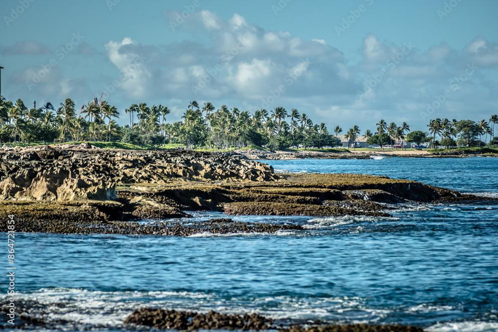 Beautiful blue sky and beach scenes on secret beach oahu hawaii Beautiful blue sky and beach scenes on secret beach oahu hawaii