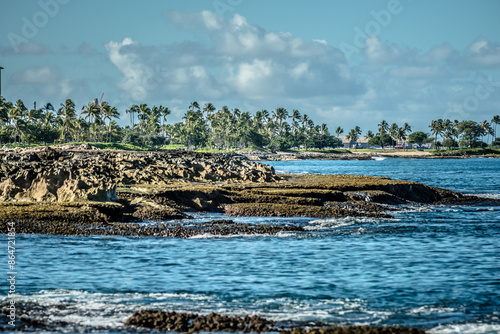 Beautiful blue sky and beach scenes on secret beach oahu hawaii