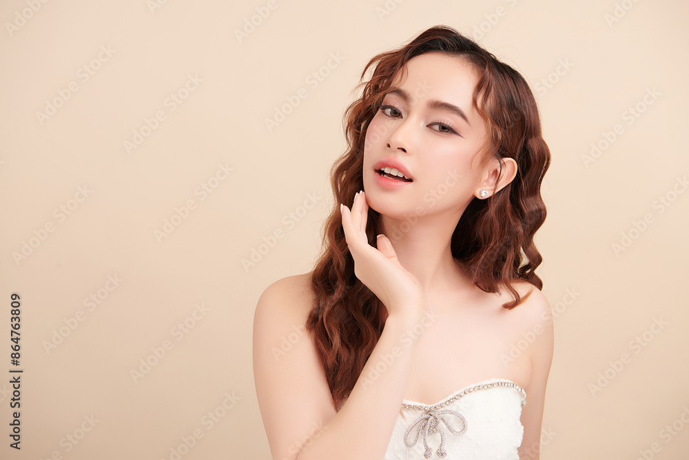 Beautiful young asian woman with clean fresh skin on beige background, Face care, Facial treatment, Cosmetology, beauty and spa, Asian women portrait. Beautiful young asian woman with clean fresh skin on beige background, Face care, Facial treatment, Cosmetology, beauty and spa, Asian women portrait.