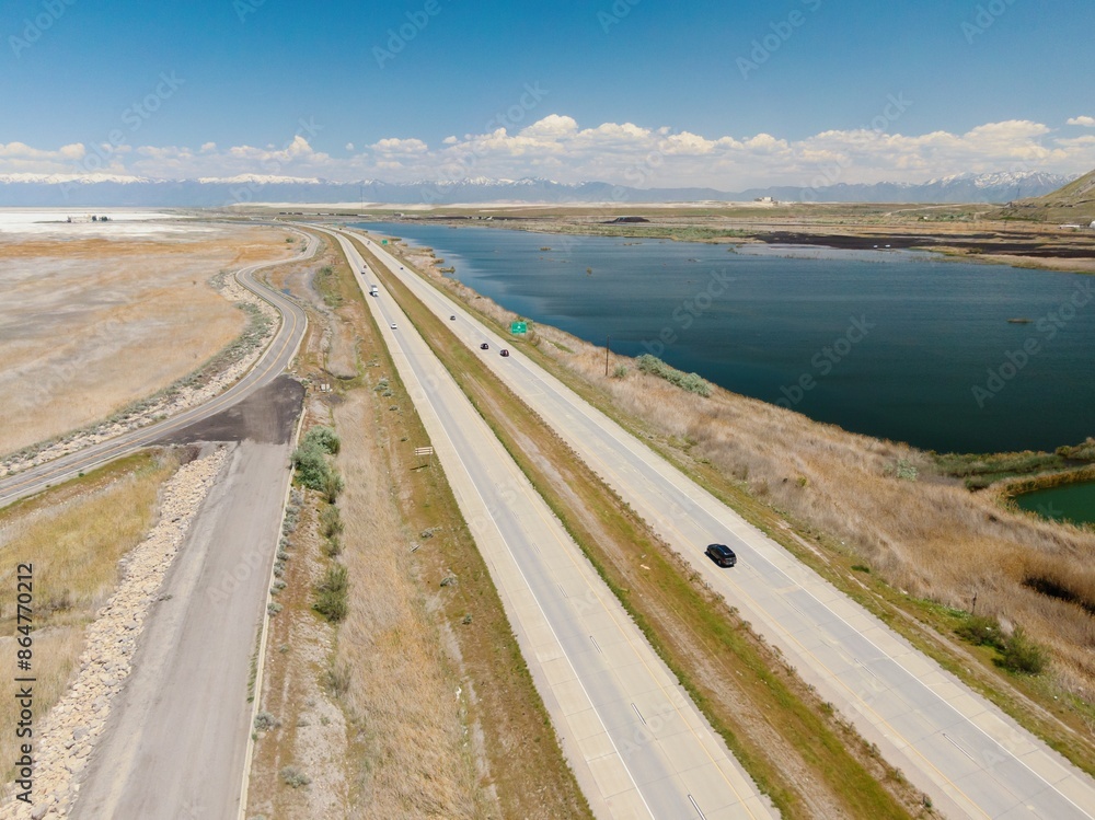 Fototapeta premium Interstate 80 freeway on the shoreline of The Great Salt Lake, Salt Lake City, Utah, United States of America. 