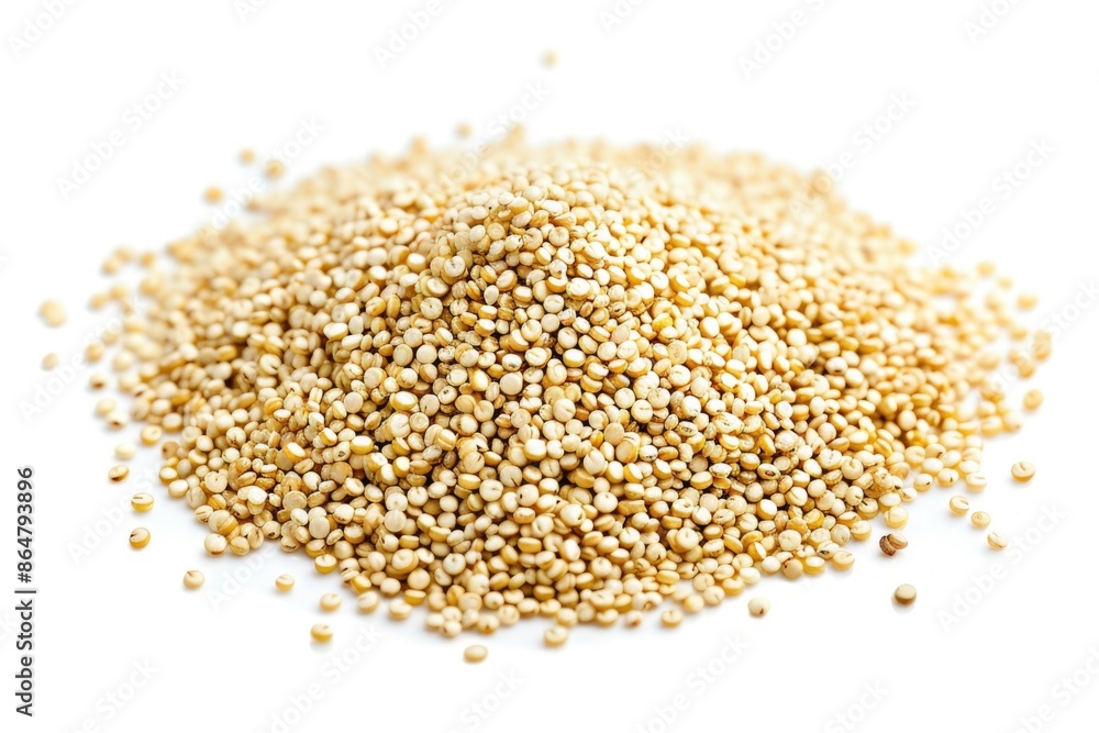 A pile of white quinoa seeds. They are spread out on a white surface A pile of white quinoa seeds. They are spread out on a white surface