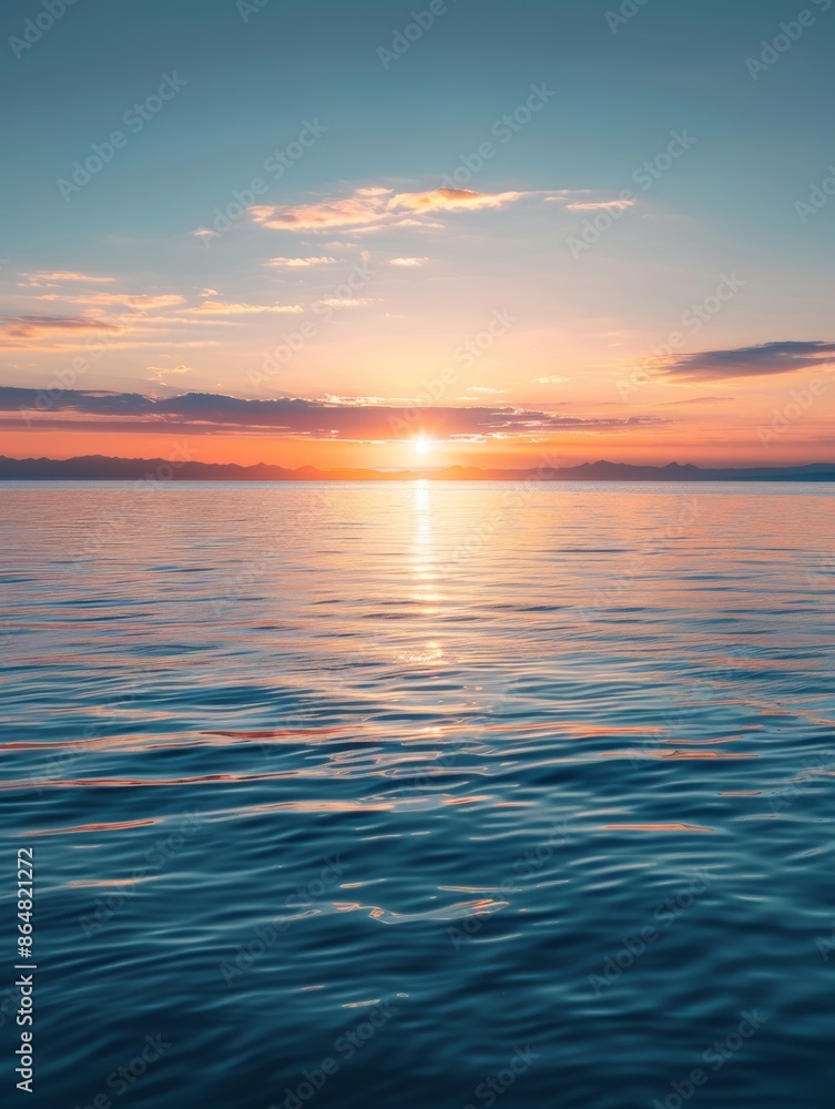 Fototapeta premium Sunset Over Calm Ocean Water