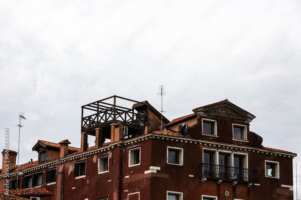 View to typical house in Venice with windows with shutters View to typical house in Venice with windows with shutters