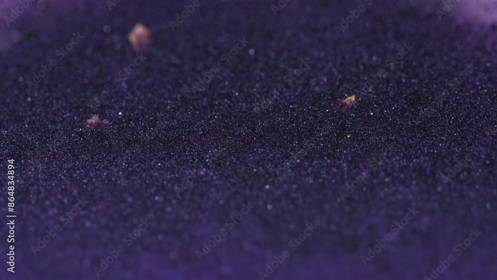 Liquid shimmer texture. Glitter paint flow. Blur purple black color sparkling metallic sequin sand particles ink fluid wave motion abstract art background with bokeh lights. Liquid shimmer texture. Glitter paint flow. Blur purple black color sparkling metallic sequin sand particles ink fluid wave motion abstract art background with bokeh lights.