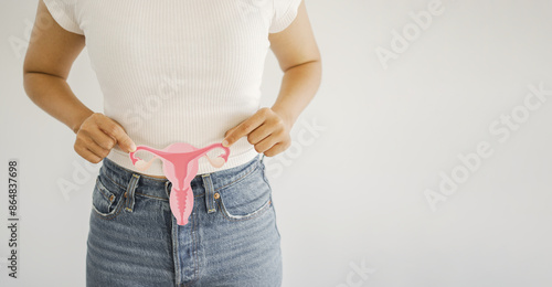 Woman hands holding uterus vagina, fertility treatment , woman health, obstetrics gynecology and cervix cancer concept