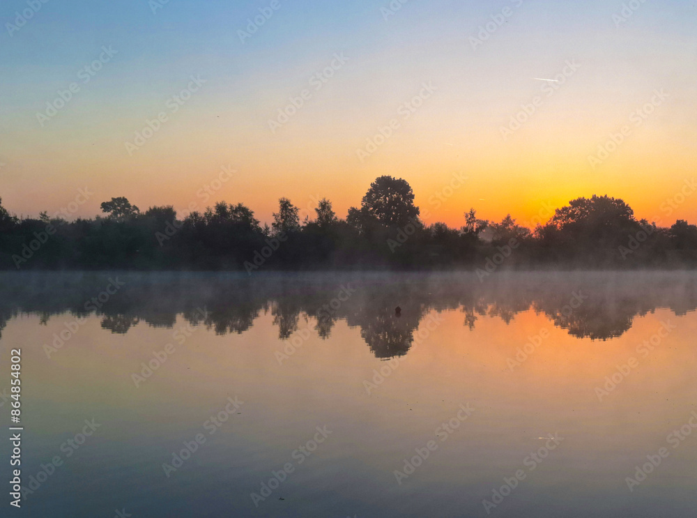 Obraz premium sunrise over lake