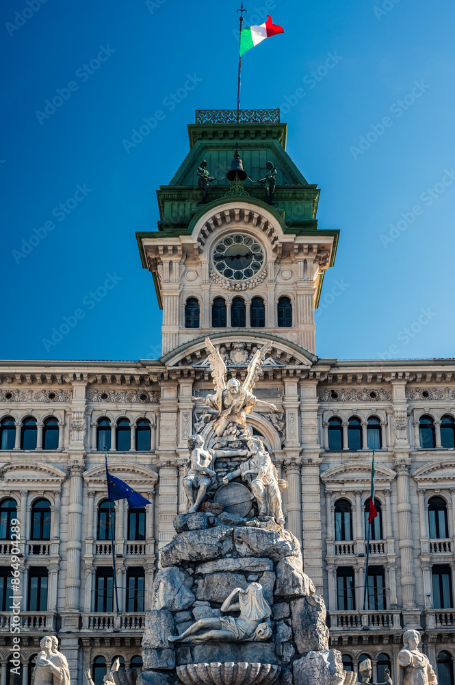 Obraz premium Historic city of Trieste. Between ancient buildings and reflections on the sea. Autumn day and celebration of the Barcolana International Regatta.