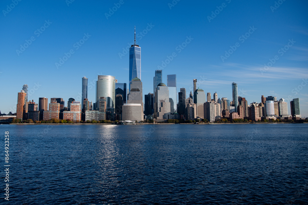 Fototapeta premium New York, United States. Panorama view of New York city skyline in Midtown Manhattan. USA, NYC, NY, Manhattan. American big city. Lower Manhattan skyline. New York from New Jersey.